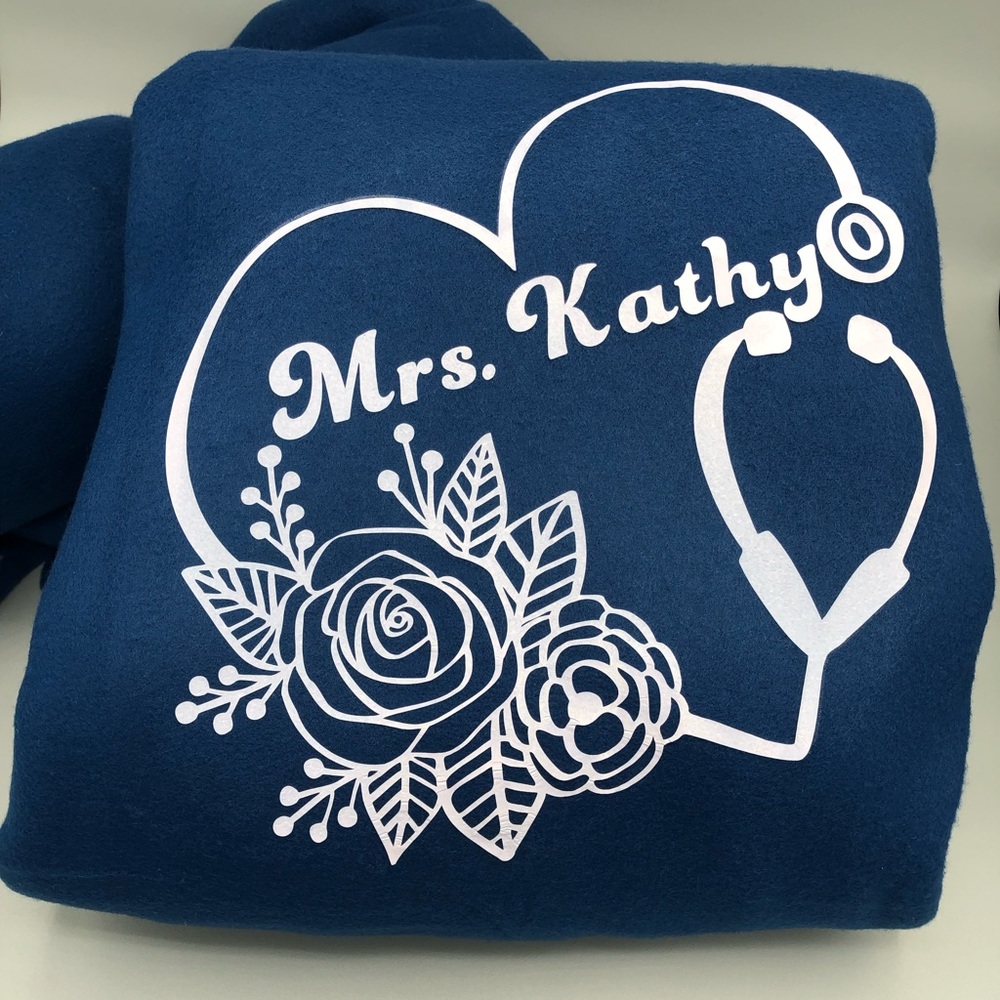 Personalize with a requested name. Stethoscope and flowers design.
